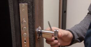 Master makes repairs changes lock in doors